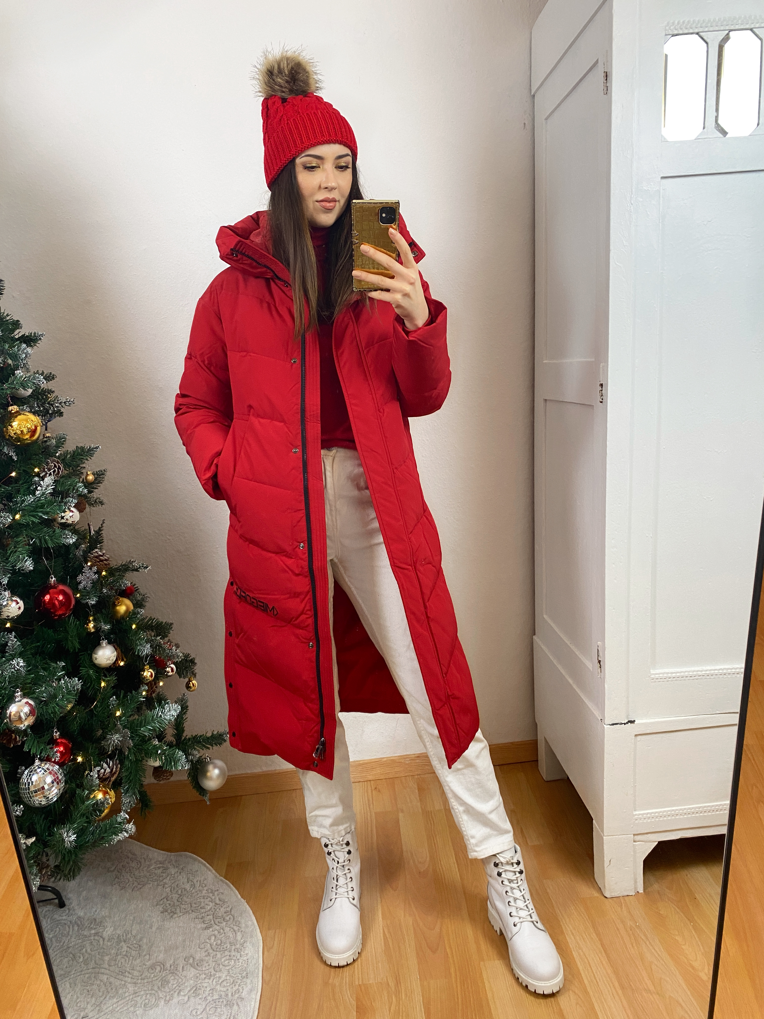 Red Puffer Jacket and White Jeans Outfit