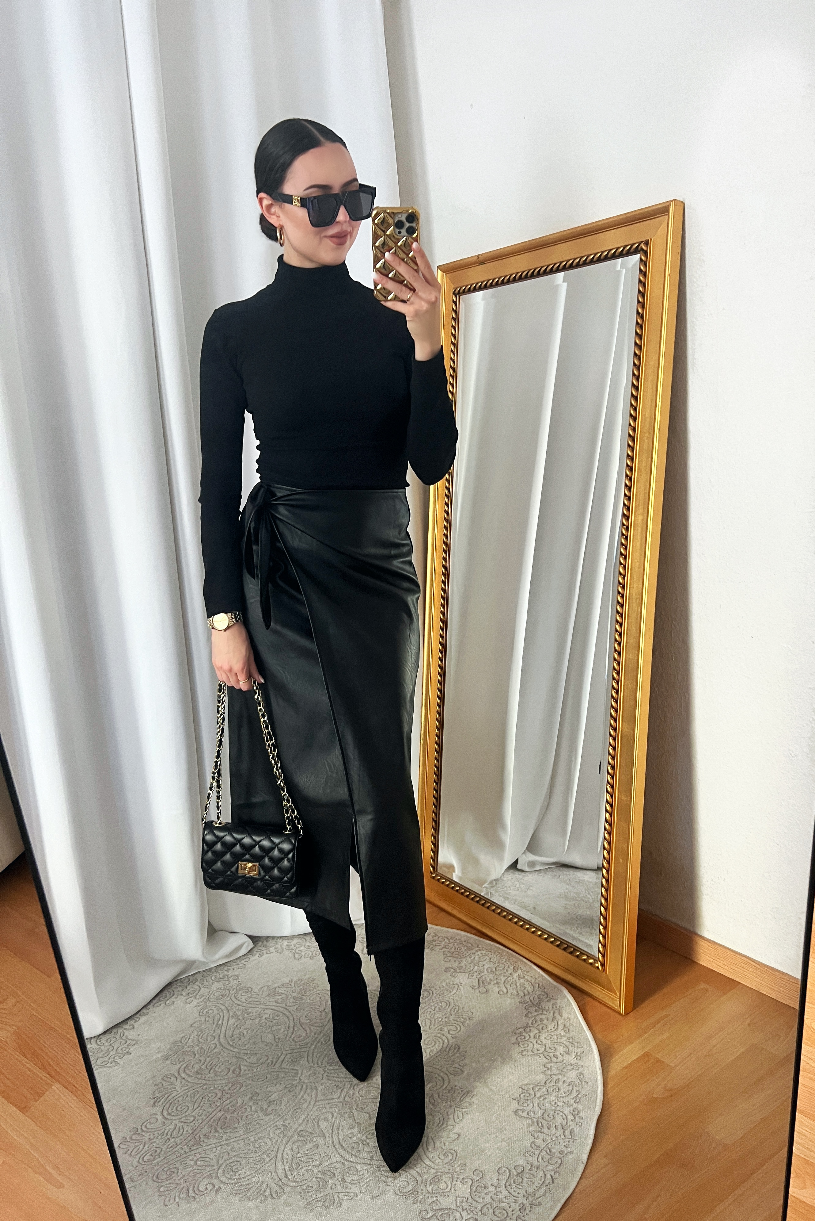 Tight Black Turtleneck and Black Leather Wrap Skirt Outfit
