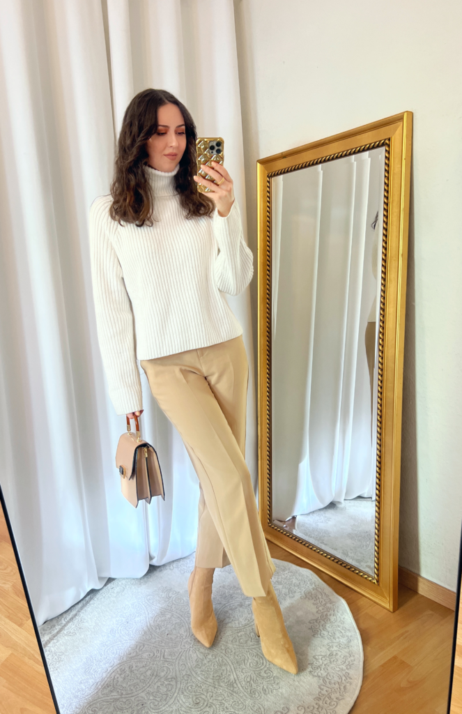 White Turtleneck Sweater and Beige Pants Outfit 1 png