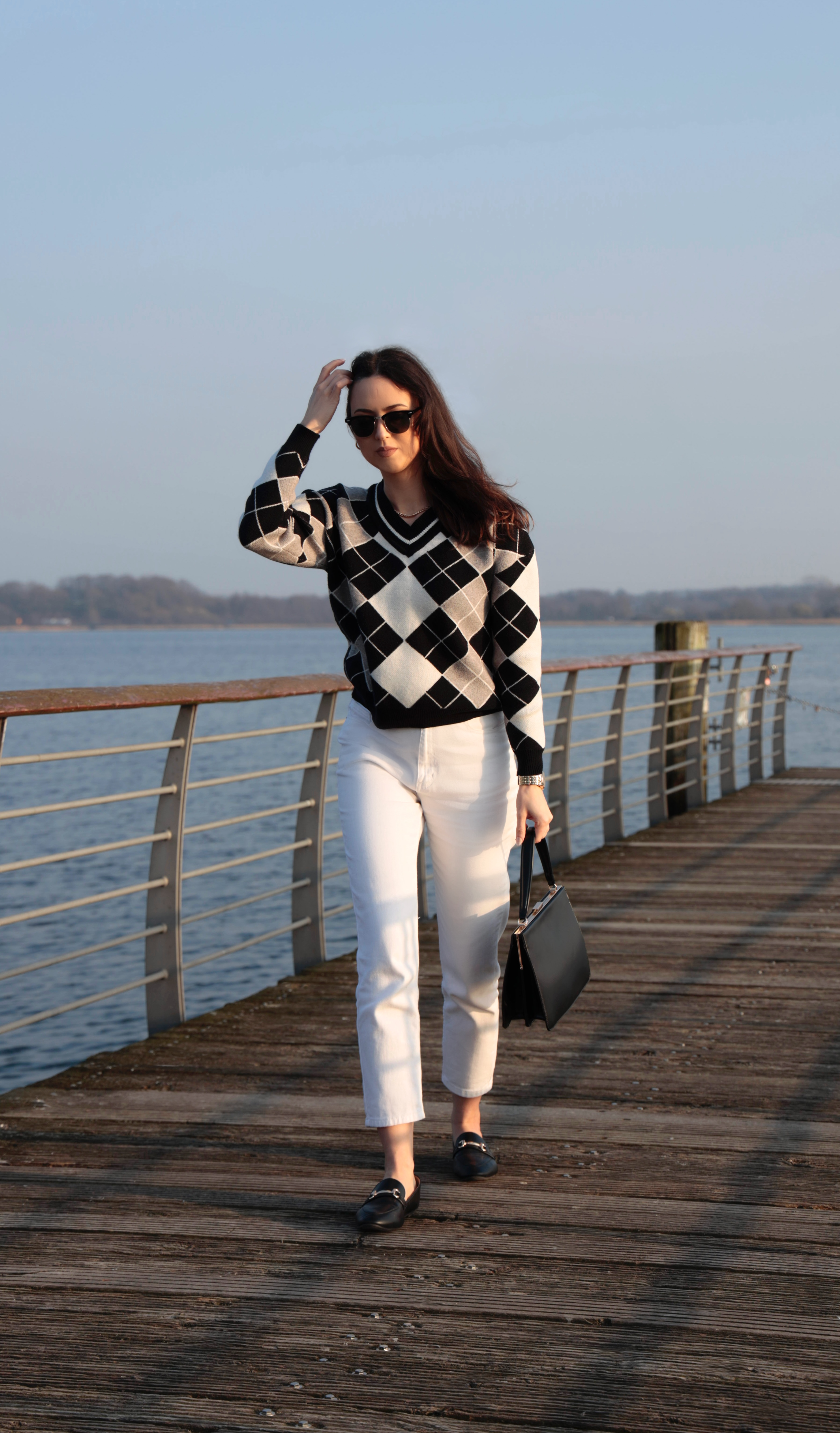 Black and White Argyle Sweater Outfit with White Mom Jeans