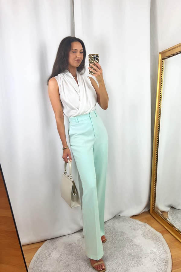 Turquoise Pants Outfit with White Sleeveless Blouse